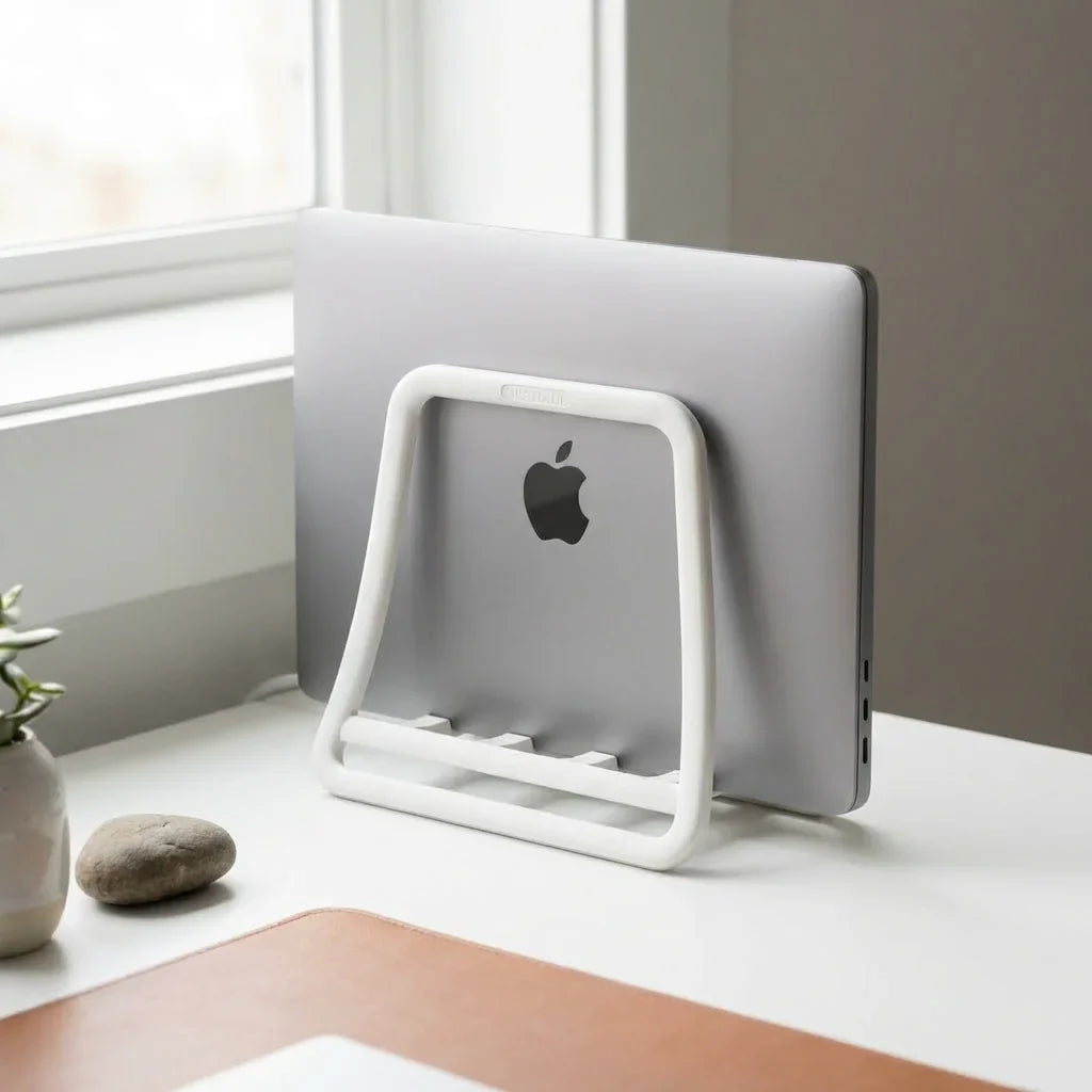 NexStand K11 White Vertical Laptop Stand on a minimalist desk